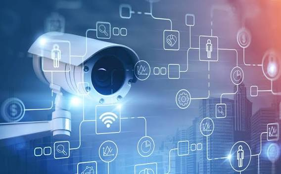 A security camera linked to a city network diagram